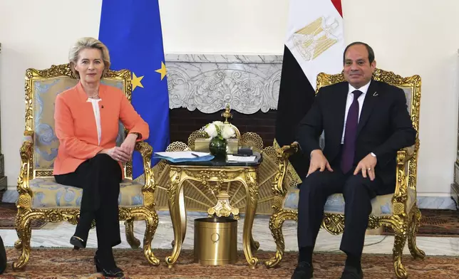 In this photo provided by Egypt's presidency media office, Egyptian President Abdel-Fattah el-Sissi, right, meets European Commission president Ursula Von der Leyen, at the Presidential Palace in Cairo, Egypt, Sunday, March 17, 2024. (Egyptian Presidency Media Office via AP)