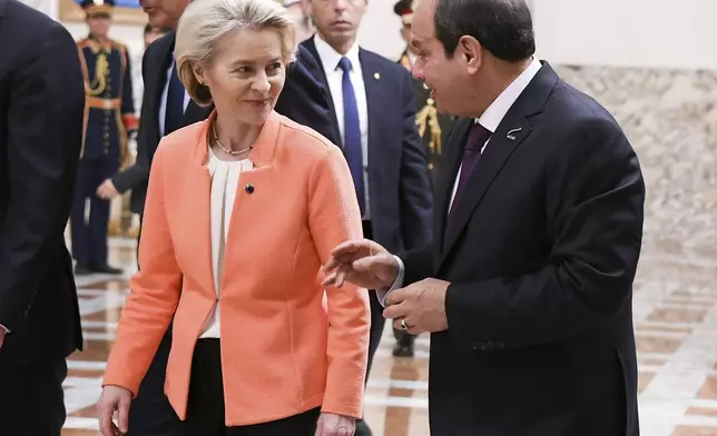In this photo provided by Egypt's presidency media office, Egyptian President Abdel-Fattah el-Sissi, right, talks to European Commission president Ursula Von der Leyen, at the Presidential Palace in Cairo, Egypt, Sunday, March 17, 2024. (Egyptian Presidency Media Office via AP)