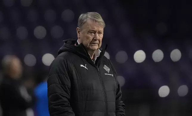 Iceland's coach Age Hareide stands during the Euro 2024 qualifying play-off soccer match between Israel and Iceland, at Szusza Ferenc Stadium in Budapest, Hungary, Thursday, March 21, 2024. (AP Photo/Darko Vojinovic)