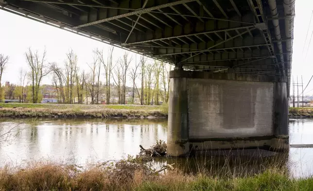 The underside of the Fishing Wars Memorial Bridge, which has been closed indefinitely since October 2023 after the Federal Highway Administration raised safety concerns, is shown Tuesday, March 26, 2024, in Tacoma, Wash. Nearby business owners say they have noticed a decrease in customers as traffic has slowed on their street due to the closure. (AP Photo/Lindsey Wasson)