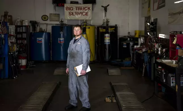 Big Truck Service owner Brandon Bauer, who says he has seen business drop by a third since the indefinite closure of the nearby Fishing Wars Memorial Bridge, poses for a portrait Tuesday, March 26, 2024, in Fife, Wash. The bridge has been closed since October 2023 after the Federal Highway Administration raised safety concerns, causing nearby business owners to notice a decrease in customers as drivers bypass their street. (AP Photo/Lindsey Wasson)