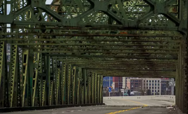 The Fishing Wars Memorial Bridge, which has been closed indefinitely since October 2023 after the Federal Highway Administration raised safety concerns, is shown Tuesday, March 26, 2024, in Tacoma, Wash. Nearby business owners say they have noticed a decrease in customers as traffic has slowed on their street due to the closure. (AP Photo/Lindsey Wasson)