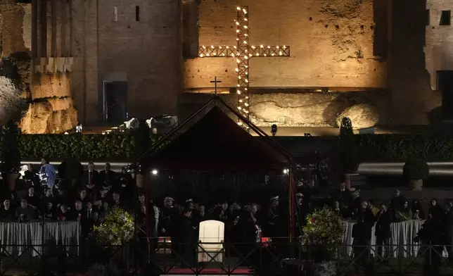 Pope Francis' chair is seen prior to start of the lthe Via Crucis (Way of the Cross) at Colosseum on Good Friday in Rome, Friday, March 29, 2024. (AP Photo/Gregorio Borgia)