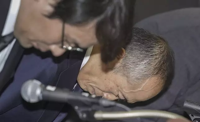 Akihiro Kobayashi, president of Kobayashi Pharmaceutical Co., bows in apology at a news conference in Osaka, western Japan, Friday, March 29, 2024. In the week since a line of Japanese health supplements began being recalled, several people have died and more than 100 people were hospitalized as of Friday. The Osaka-based pharmaceutical company came under fire for not going public quickly with problems known internally as early as January. The first public announcement came March 22. (Kyodo News via AP)