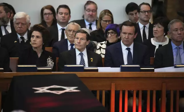 Current and former elected officials including Senators Richard Blumenthal and Chris Murphy, Congresswoman Rosa DeLauro, and Senator Susan Collins listen to reflections during the funeral for former Senator Joe Lieberman in Stamford, Conn., Friday, March. 29, 2024. (AP Photo/Bryan Woolston)
