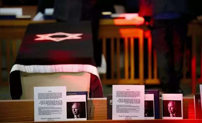 The casket of former Sen. Joe Lieberman in the sanctuary of Congregation Agudath Sholom, during his funeral in Stamford, Conn., Friday, March. 29, 2024. (AP Photo/Bryan Woolston)