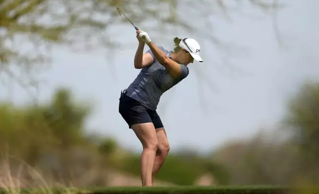 Caroline Masson hits from the fourth tee during the first round of LPGA Ford Championship golf tournament, Thursday, March 28, 2024, in Gilbert, Ariz. (AP Photo/Matt York)