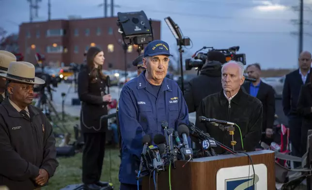 Rear Adm. Shannon Gilreath, commander of the Fifth Coast Guard District, speaks in Dundalk, Md., on Tuesday, March 26, 2024, as officials announce that all six workers missing after a Baltimore bridge collapsed are presumed dead and the search for them has been suspended until Wednesday morning. Officials said that the search and rescue mission was transitioning to one of search and recovery. (AP Photo/Ted Shaffrey)