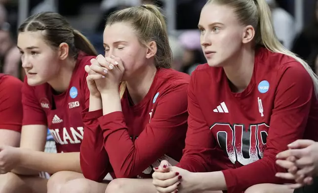 Indiana players react on the bench during the second half of a Sweet Sixteen round college basketball game against the South Carolina during the NCAA Tournament, Friday, March 29, 2024, in Albany, N.Y. (AP Photo/Mary Altaffer)