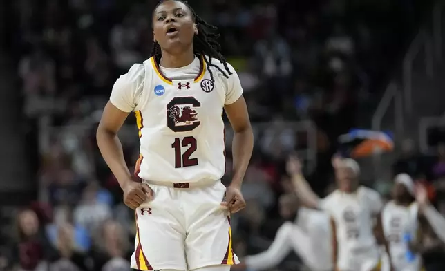 South Carolina guard MiLaysia Fulwiley (12) reacts during the first half of a Sweet Sixteen round college basketball game against the Indiana during the NCAA Tournament, Friday, March 29, 2024, in Albany, N.Y. (AP Photo/Mary Altaffer)