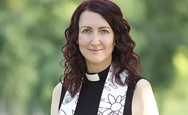 In this image provided by Sarah Bown, animal chaplain Sarah Bowen, author photo for "Sacred Sendoffs: An Animal Chaplain's Advice for Surviving Animal Loss, Making Life Meaningful, and Healing the Planet," poses in 2022. (Francesco Mastalia/Sarah Bowen via AP)