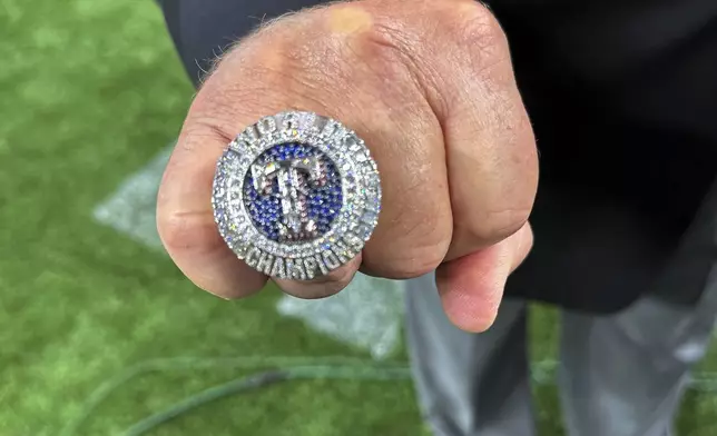 The Texas Rangers championship ring is seen Saturday, March 30, 2024 in Arlington Texas. The Texas Rangers and staff will receive their World Series championship rings during a pre-game ceremony before the Texas Rangers take on the Chicago Cubs in a baseball game. (AP Photo/Stephen Hawkins)