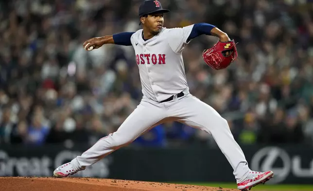 Boston Red Sox starting pitcher Brayan Bello throws against the Seattle Mariners during the first inning of an opening day baseball game, Thursday, March 28, 2024, in Seattle. (AP Photo/Lindsey Wasson)