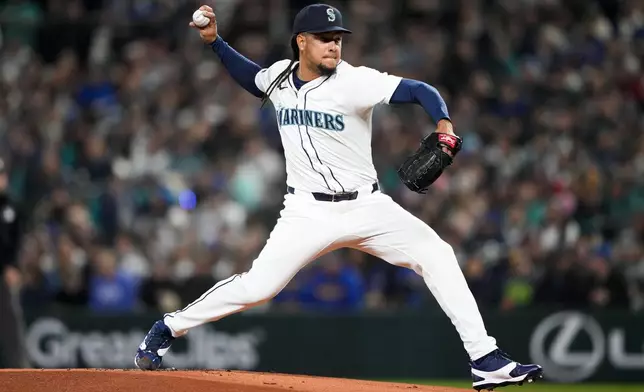 Seattle Mariners starting pitcher Luis Castillo throws against the Boston Red Sox during the first inning of an opening day baseball game, Thursday, March 28, 2024, in Seattle. (AP Photo/Lindsey Wasson)
