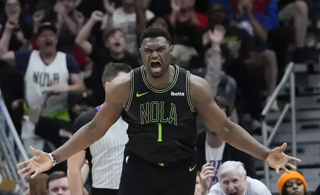 New Orleans Pelicans forward Zion Williamson (1) reacts after tying the game in the second half of an NBA basketball game against the Oklahoma City Thunder in New Orleans, Tuesday, March 26, 2024. The Thunder won 119-112. (AP Photo/Gerald Herbert)