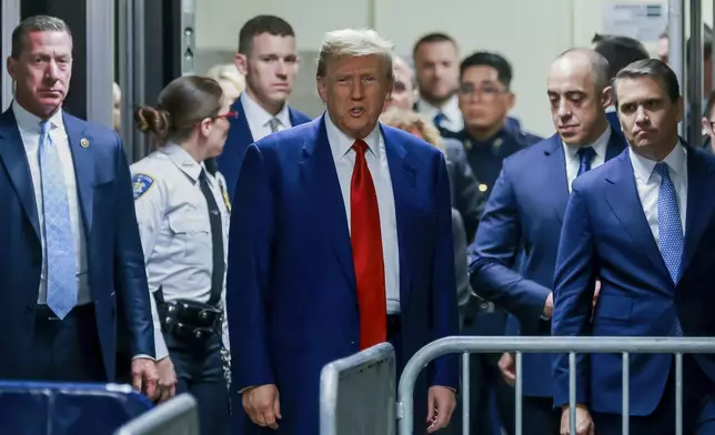 Former President Donald Trump arrives for the start of a hearing at New York Criminal Court in New York, Monday, March 25, 2024. (Justin Lane/Pool Photo via AP)