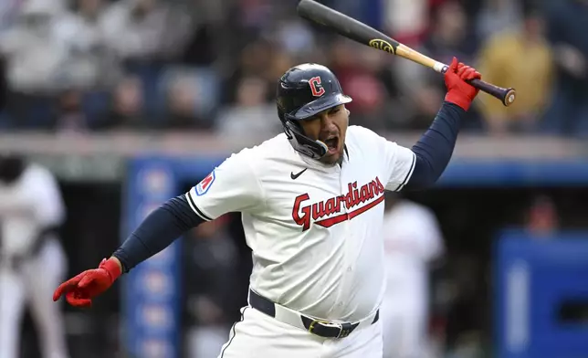 Cleveland Guardians' Josh Naylor celebrates his two-run home run off Oakland Athletics starting pitcher Alex Wood during the fifth inning of a baseball game Saturday, April 20, 2024, in Cleveland. (AP Photo/Nick Cammett)