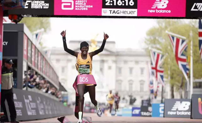 Peres Jepchirchir of Kenya crosses the finish line to win the women's race at the London Marathon in London, Sunday, April 21, 2024.(AP Photo/David Cliff)