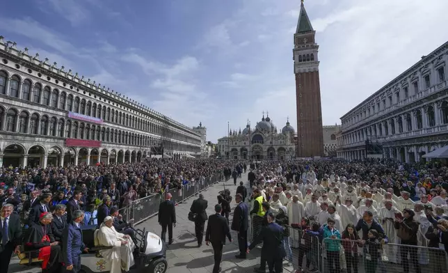Pope Francis arrives in St. Mark’s Square to celebrate a mass in Venice, Italy, Sunday, April 28, 2024. The Pontiff arrived for his first-ever visit to the lagoon town including the Vatican pavilion at the 60th Biennal of Arts. (AP Photo/Alessandra Tarantino)