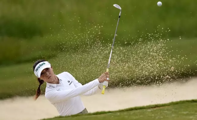Lydia Ko hits out of the bunker on the 10th green during the first round of the Chevron Championship LPGA golf tournament Thursday, April 18, 2024, at The Club at Carlton Woods, in The Woodlands, Texas. (AP Photo/David J. Phillip)
