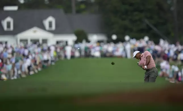 Tiger Woods hits from the fairway on the first hole during the first round of the Masters golf tournament at Augusta National Golf Club, Thursday, April 11, 2024, in Augusta, Ga. (AP Photo/Matt Slocum)