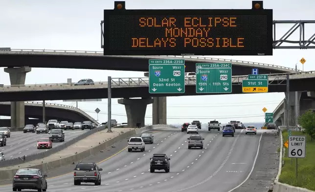 Motorists traveling toward Austin, Texas are reminded of Monday's eclipse and the possibility of traffic delays Saturday, April 6, 2024, in Austin. (AP Photo/Charles Rex Arbogast)