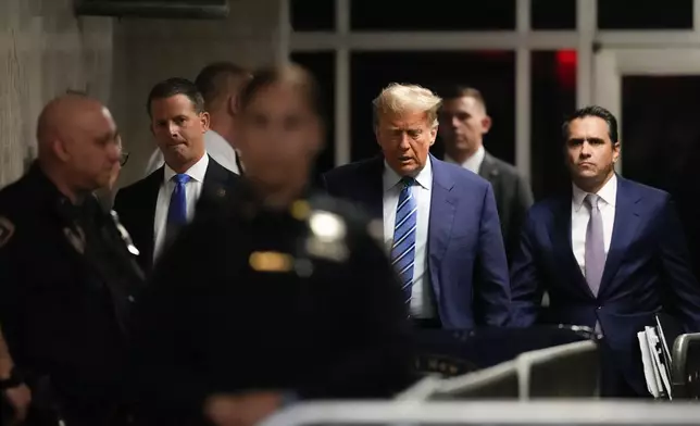 Former President Donald Trump arrives at Manhattan criminal court, Tuesday, April 16, 2024, in New York. Donald Trump returned to the courtroom Tuesday as a judge works to find a panel of jurors who will decide whether the former president is guilty of criminal charges alleging he falsified business records to cover up a sex scandal during the 2016 campaign. (AP Photo/Mary Altaffer)