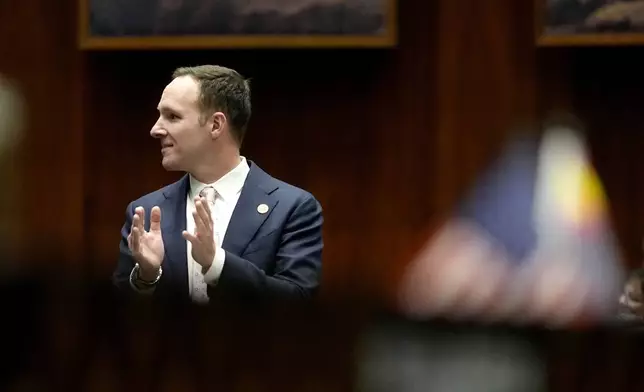 Arizona State Rep. Matt Gress, applauds on the House floor, Wednesday, April 17, 2024, at the Capitol in Phoenix. (AP Photo/Matt York)