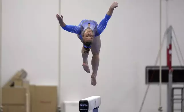 Joscelyn Roberson competes on the balance beam at the American Classic Saturday, April 27, 2024, in Katy, Texas. (AP Photo/David J. Phillip)