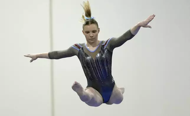 Jade Carey competes on the balance beam at the American Classic Saturday, April 27, 2024, in Katy, Texas. (AP Photo/David J. Phillip)