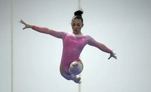 Sunisa Lee competes on the blance beam at the American Classic Saturday, April 27, 2024, in Katy, Texas. (AP Photo/David J. Phillip)