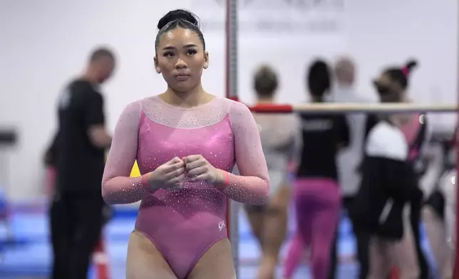 Sunisa Lee waits to compete on the blance beam at the American Classic Saturday, April 27, 2024, in Katy, Texas. (AP Photo/David J. Phillip)
