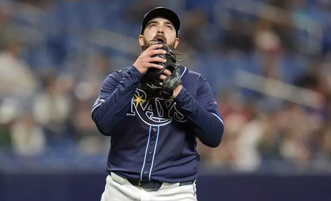 Tampa Bay Rays' Aaron Civale reacts after giving up a two-run home run to Los Angeles Angels' Mickey Moniak during the fourth inning of a baseball game Tuesday, April 16, 2024, in St. Petersburg, Fla. (AP Photo/Chris O'Meara)