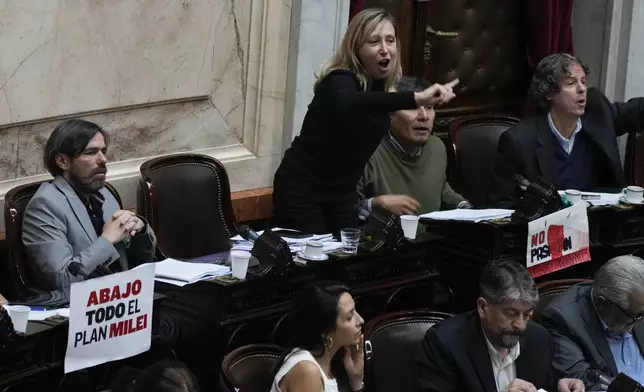 Opposition lawmaker Myriam Bregman speaks during a debate on a bill promoted by Argentine President Javier Milei at Congress in Buenos Aires, Argentina, Tuesday, April 30, 2024. The bill includes a broad range of economic, administrative, criminal, and environmental reforms. (AP Photo/Natacha Pisarenko)