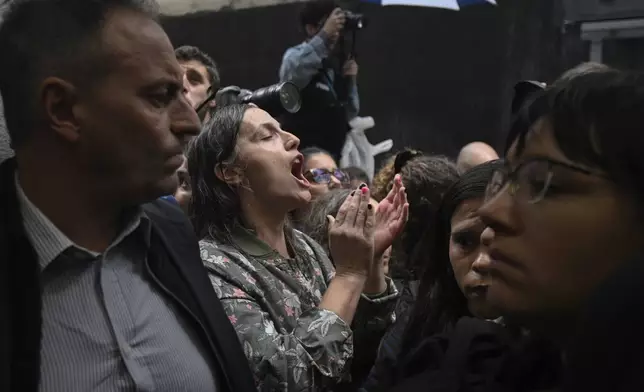 Demonstrators chant slogans during an anti-government protest after some workers were laid off as part of state economic downsizing measures, in Buenos Aires, Argentina, Wednesday, April 3, 2024. According to the State Workers Association, more than 11 thousand dismissals of state employees have been carried out by Javier Milei’s government. The union is calling for massive and simultaneous re-entry of dismissed individuals. (AP Photo/Gustavo Garello)