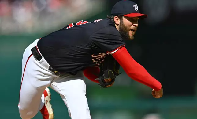 Washington Nationals pitcher Trevor Williams throws during the first inning of a baseball game against the Houston Astros at Nationals Park, Saturday, April 20, 2024, in Washington. (AP Photo/John McDonnell)