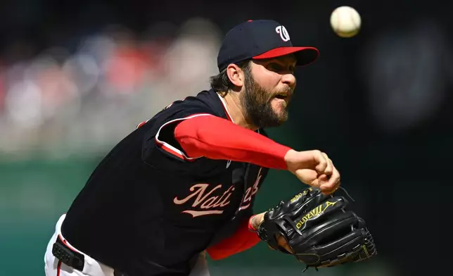 Washington Nationals pitcher Trevor Williams throws during the first inning of a baseball game against the Houston Astros at Nationals Park, Saturday, April 20, 2024, in Washington. (AP Photo/John McDonnell)