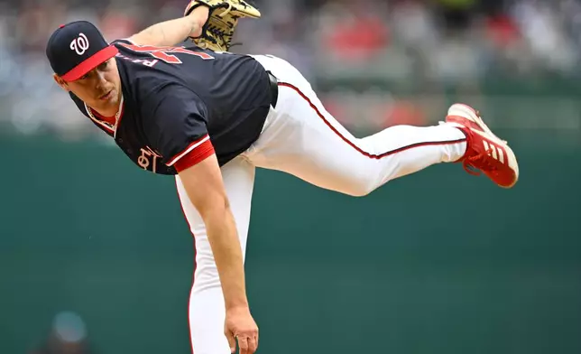 Washington Nationals pitcher Mitchell Parker throws during the first inning of a baseball game against the Houston Astros at Nationals Park, Sunday, April 21, 2024, in Washington. (AP Photo/John McDonnell)