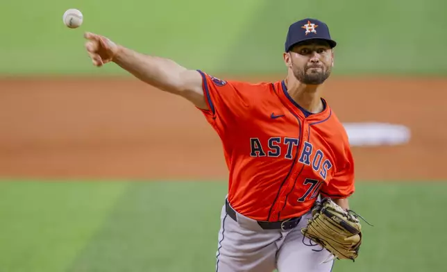 Houston Astros starting pitcher Blair Henley delivers during the first inning of a baseball game against the Texas Rangers, Monday, April 8, 2024, in Arlington, Texas. (AP Photo/Gareth Patterson)
