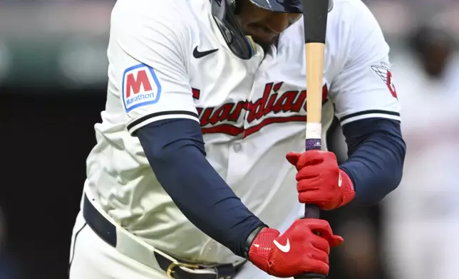 Cleveland Guardians' Josh Naylor celebrates his two-run home run off Oakland Athletics starting pitcher Alex Wood during the fifth inning of a baseball game Saturday, April 20, 2024, in Cleveland. (AP Photo/Nick Cammett)