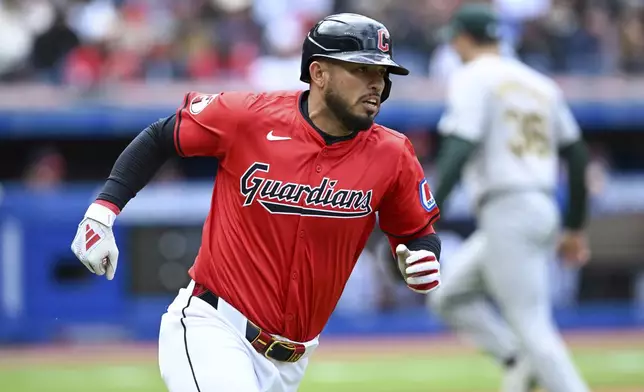 Cleveland Guardians' Gabriel Arias runs out an RBI single during the fourth inning of a baseball game against the Oakland Athletics, Sunday, April 21, 2024, in Cleveland. (AP Photo/Nick Cammett)