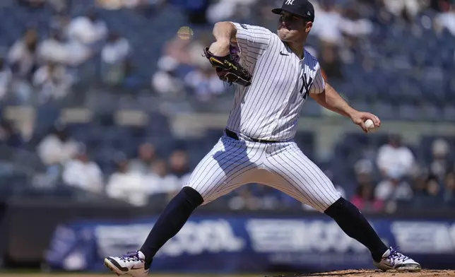 New York Yankees pitcher Carlos Rodón throws during the first inning of the baseball game against the Oakland Athletics at Yankee Stadium Monday, April 22, 2024, in New York. (AP Photo/Seth Wenig)