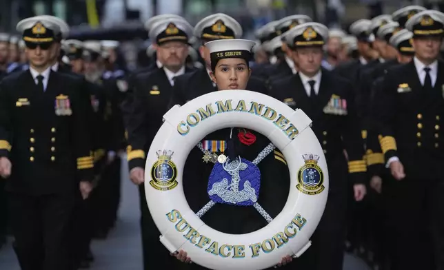 Navy personnel march during the Anzac Day parade in central the business district of Sydney, Australia, Thursday, April 25, 2024. (AP Photo/Mark Baker)