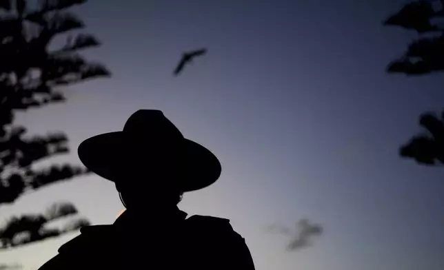 A military cadet watches events during an Anzac Day dawn service at Coogee Beach in Sydney, Australia, Thursday, April 25, 2024. (AP Photo/Mark Baker)