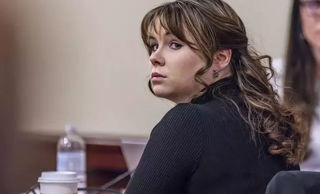 FILE - Hannah Gutierrez-Reed, the former armorer at the movie "Rust," listens to closing arguments in her trial at district court, Wednesday, March 6, 2024, in Santa Fe, N.M. Gutierrez-Reed has been incarcerated at a county jail ahead of a scheduled sentencing hearing, Monday, April 15, 2024, on a involuntary manslaughter conviction. (Luis Sánchez Saturno/Santa Fe New Mexican via AP, Pool, File)