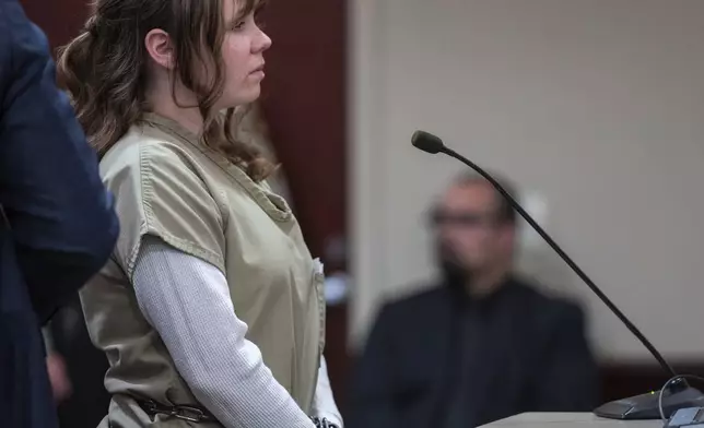 Hannah Gutierrez-Reed makes a statement to the court during her sentencing hearing in Santa Fe, New Mexico, on Monday April 15, 2024. Gutierrez-Reed, the armorer on the set of the Western film "Rust," was sentenced to 18 months in prison. She was convicted in March of involuntary manslaughter in the death of cinematographer Halyna Hutchins, who was fatally shot by Alec Baldwin in 2021. (Eddie Moore/Albuquerque Journal via AP, Pool)