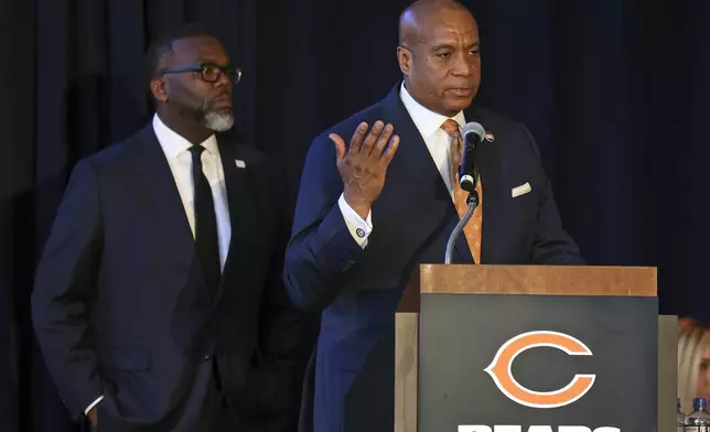 Chicago Mayor Brandon Johnson, right, joined by Chicago Bears president Kevin Warren, speaks during a news conference where NFL football team unveiled a nearly $5 billion proposal Wednesday, April 24, 2024, in Chicago, for an enclosed stadium next door to their current home at Soldier Field.(AP Photo/Teresa Crawford)