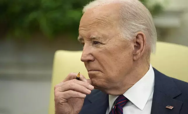 President Joe Biden listens during a meeting with Iraq's Prime Minister Shia al-Sudani in the Oval Office of the White House, Monday, April 15, 2024, in Washington. (AP Photo/Alex Brandon)