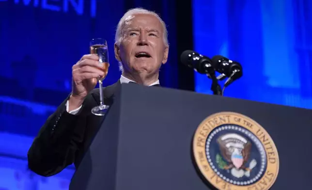 President Joe Biden makes a toast to a free press at the White House Correspondents' Association Dinner at the Washington Hilton, Saturday, April 27, 2024, in Washington. (AP Photo/Manuel Balce Ceneta)