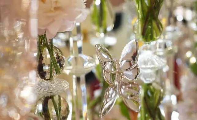 Glass butterflies decorate the dinner table during a preview at the White House in Washington, Tuesday, April 9, 2024, for the State Dinner for Japan's Prime Minister Fumio Kishida on Wednesday. (AP Photo/Susan Walsh)